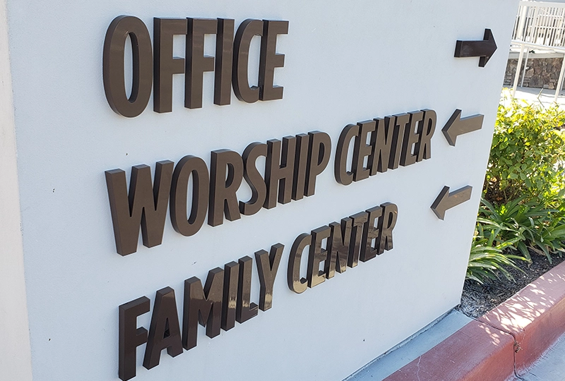 Plastic Letters with Blind Studs on Stucco Walls